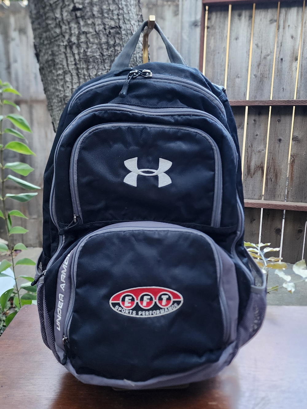 Under Armour Hustle Backpack Black Grey EFT Logo